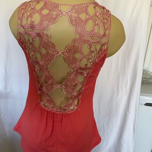Filly Flair sleeve top. It has a very delicate detailed back in a coral color. - Picture 8 of 8